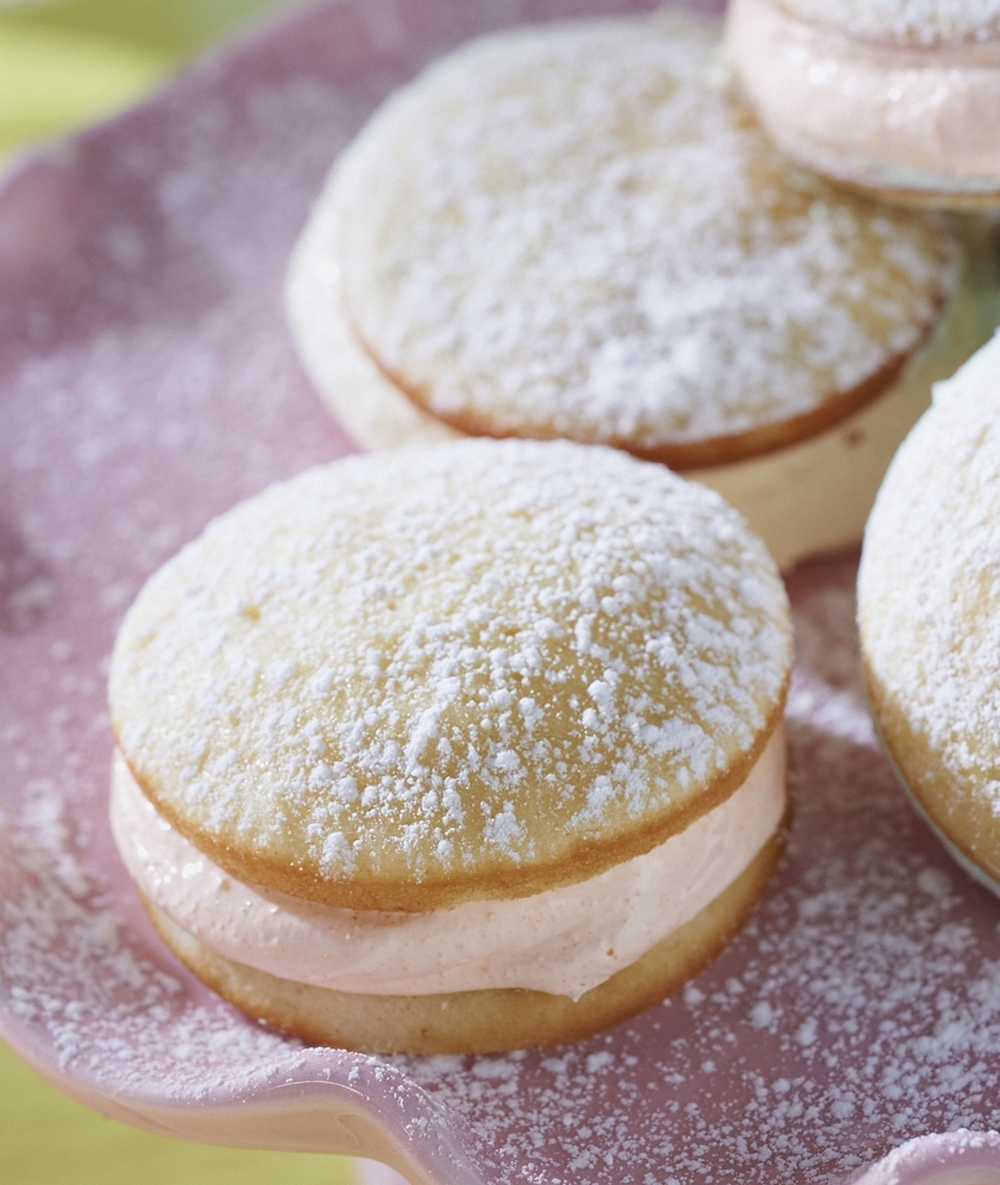 Fruity Whoopie Pies are served on a cake stand.

