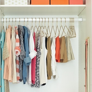 Organize your closet with smart storage solutions.
