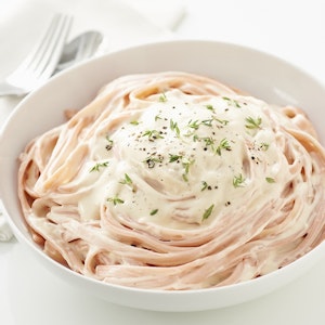 Tint pasta pink with red food coloring and serve it with delectable Alfredo Sauce.
