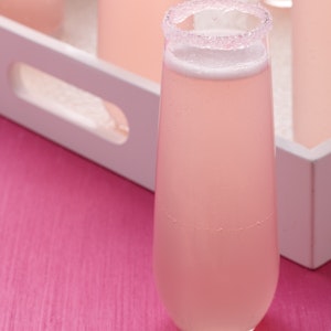 Toast the evening and the gift of love with our Sparkling Pink Punch. Add a sweet touch to each glass before filling by wetting the rim and twisting gently in a saucer of pink sugar crystals.
