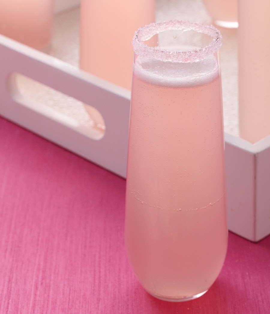 Toast the evening and the gift of love with our Sparkling Pink Punch. Add a sweet touch to each glass before filling by wetting the rim and twisting gently in a saucer of pink sugar crystals.